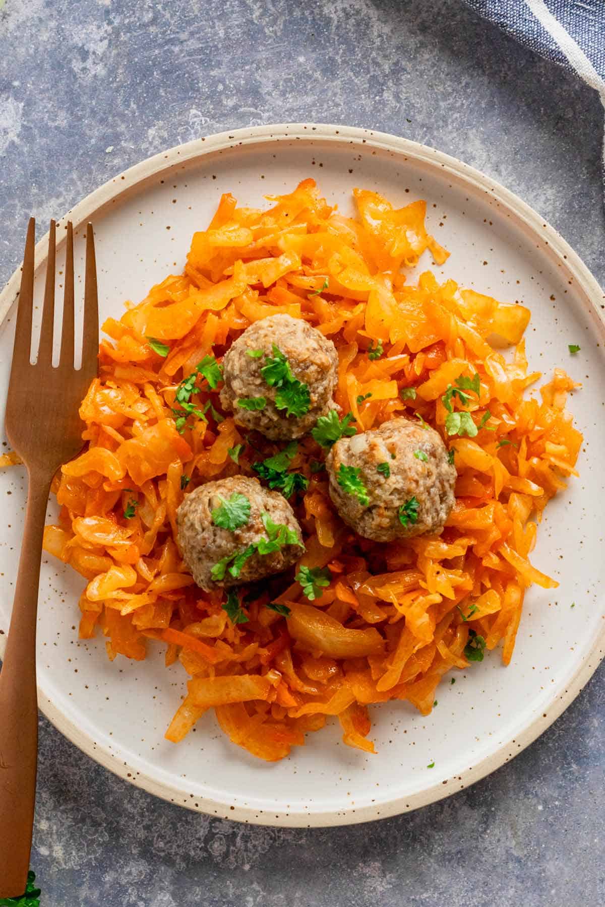 sauteed cabbage with meatballs.