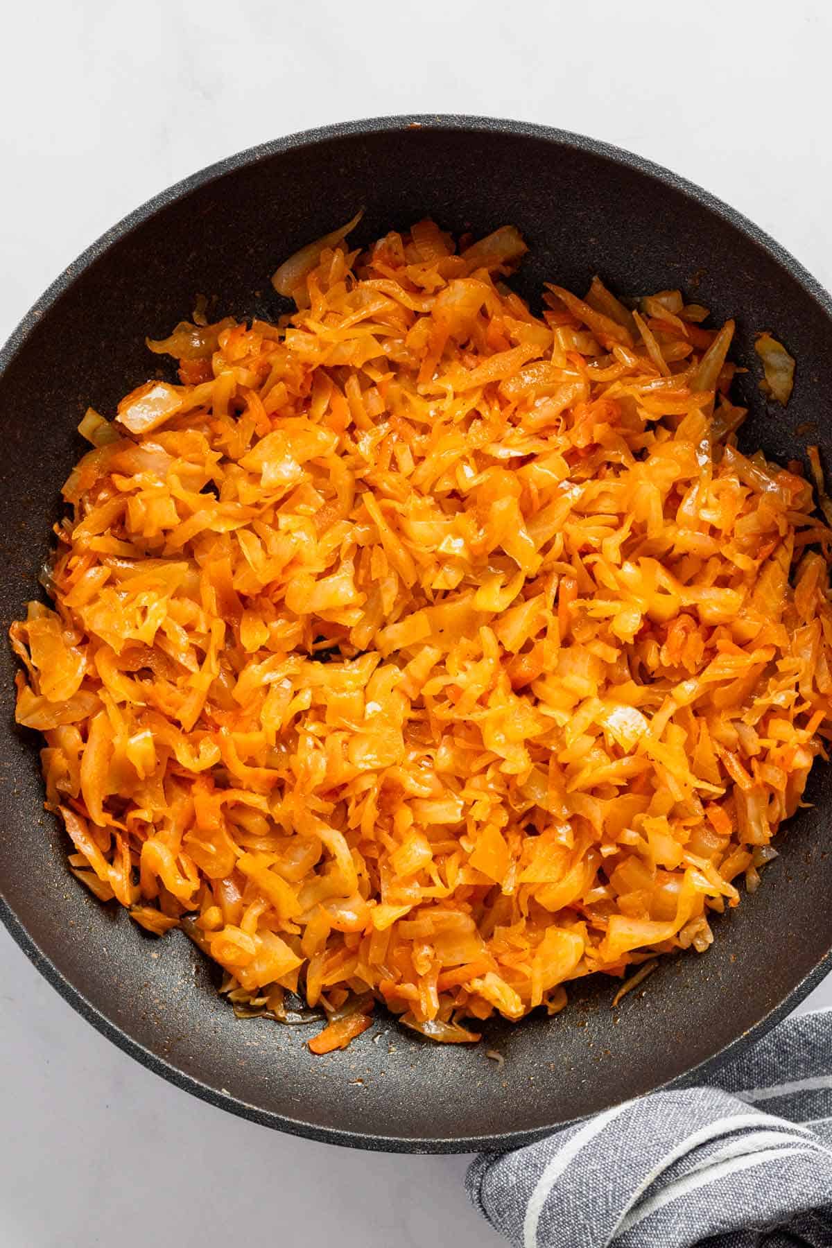 sauteed cabbage with tomato paste and onions.