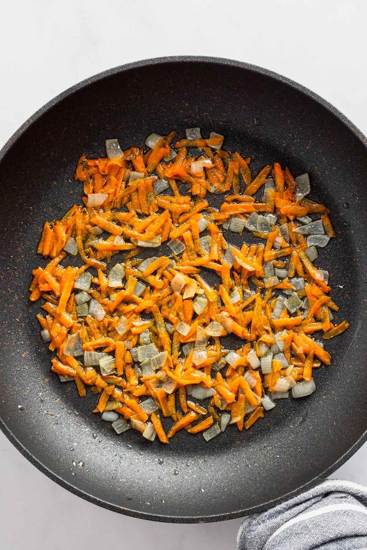 sauteeing carrots and onions.