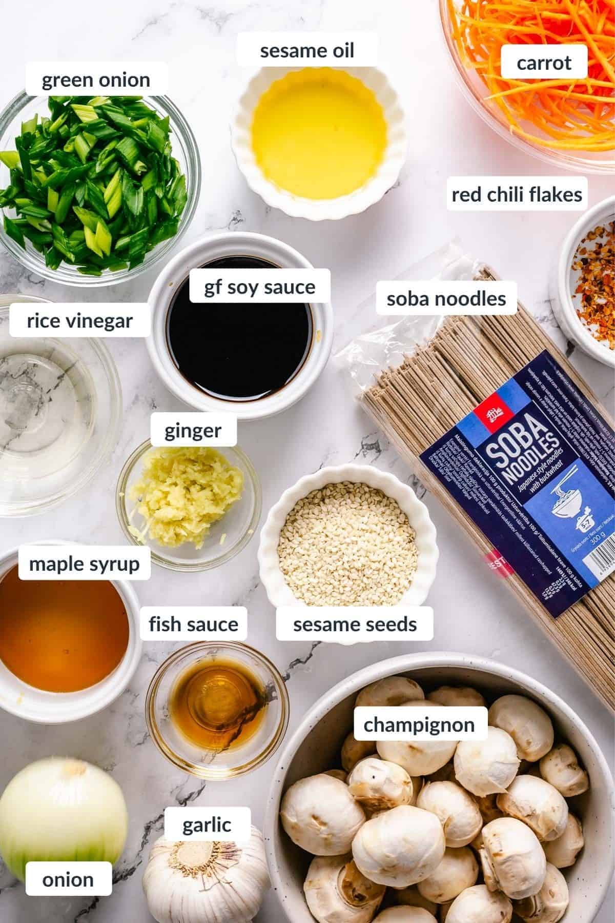 Stir Fry Soba Noodles ingredients on a white marble background flatlay