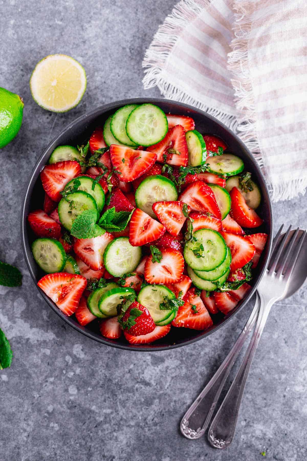 Cucumber Strawberry Salad in a black bowl