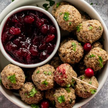 turkey stuffing meatballs served with cranberry sauce.