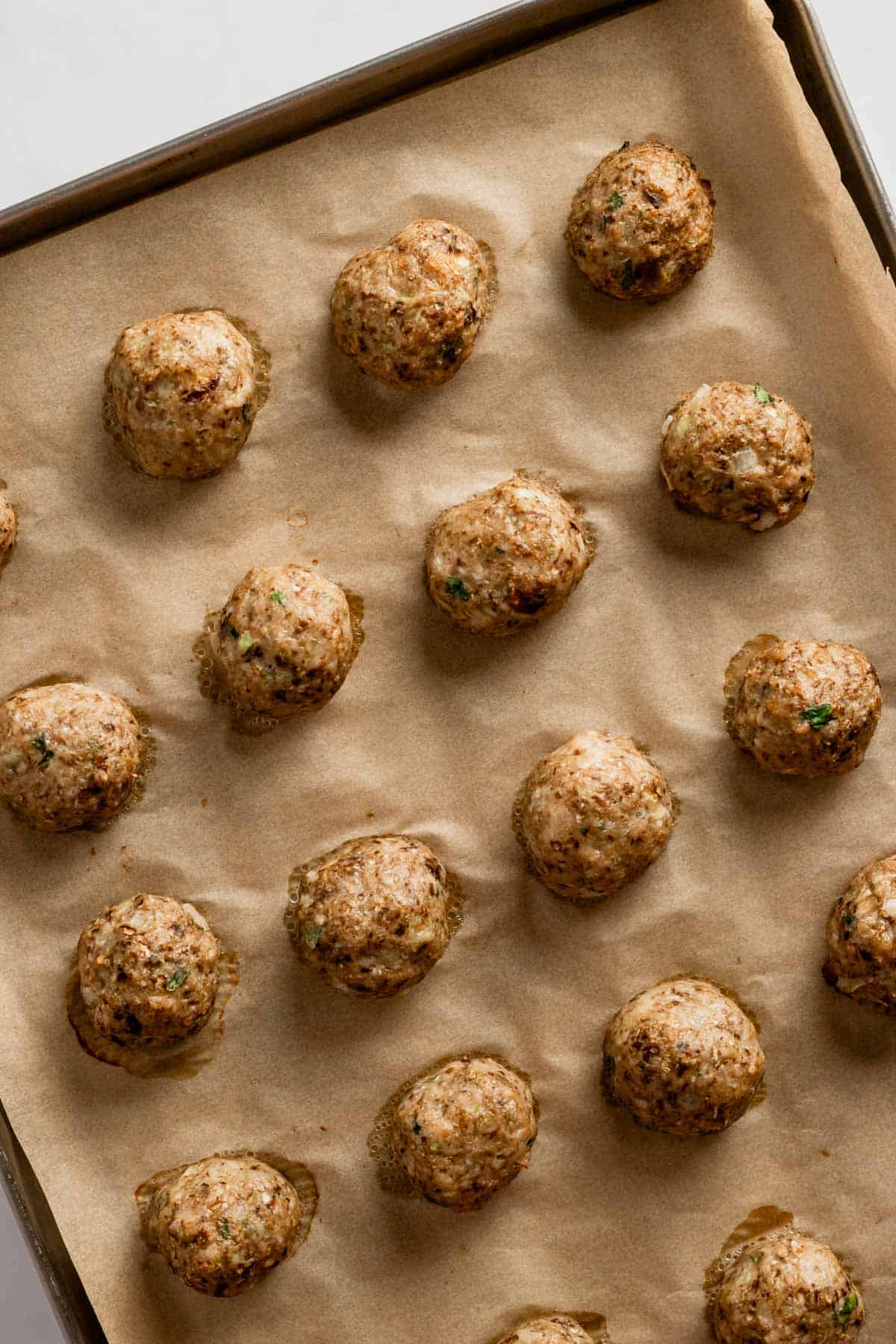 freshly baked golden brown turkey meatballs.