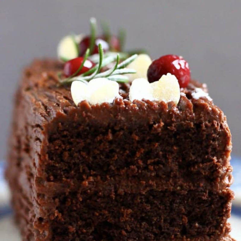 Yule Log cake cut into bars and stacked on top of each other