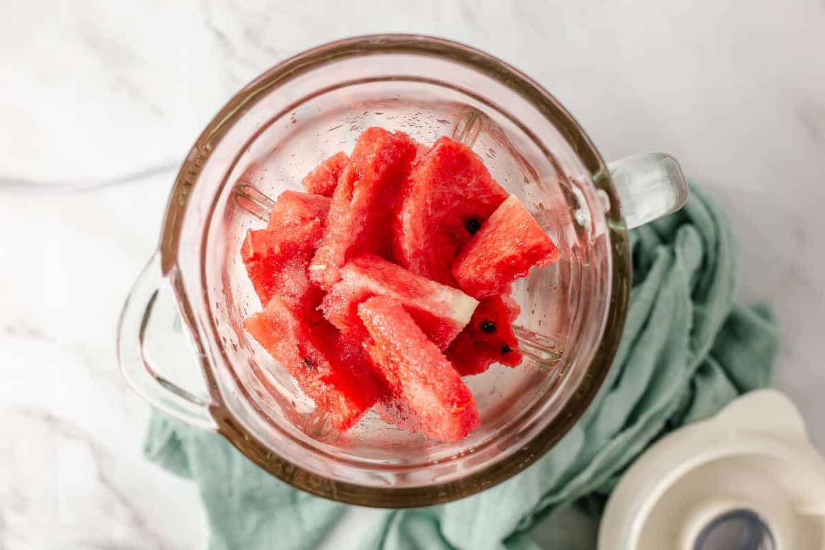 blend all the watermelon margarita cocktail ingredients in blender until smooth