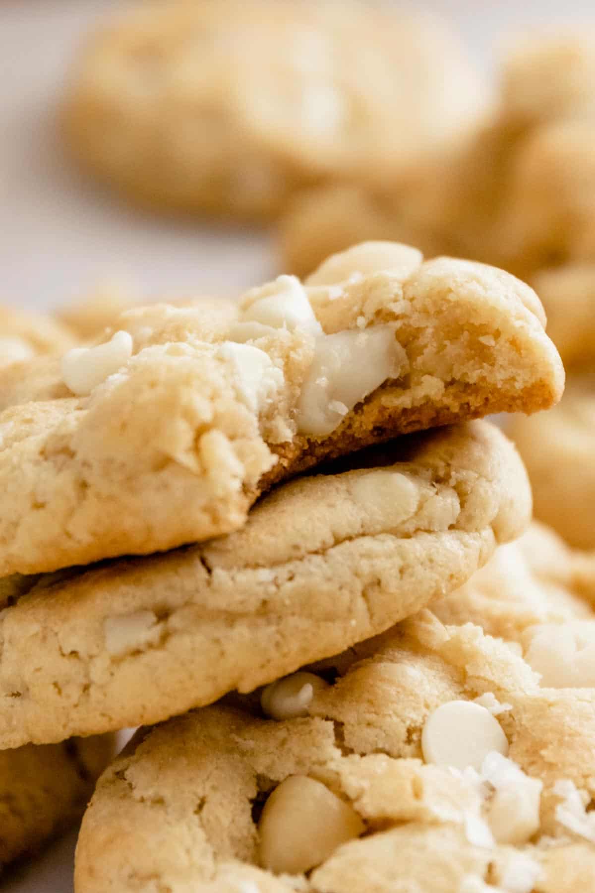 bite shot of a white chocolate macadamia nut cookies